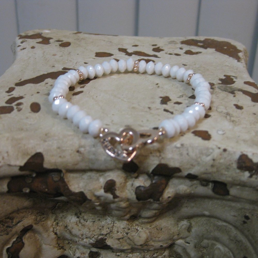 NWOT Guess white logo rose gold rhinestone heart bracelet
